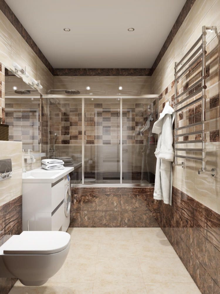 Современная ванная комната выполнена в теплых кофейных тонах. Комфортная душевая кабинка на всю ширину самой ванной комнаты. Унитаз выбран настенный для большего комфорта и удобства при уборке.
http://tzaitseva.com/