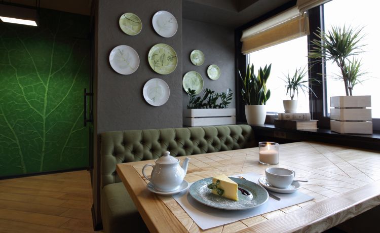 Дизайн кафе в серых и зеленых тонах